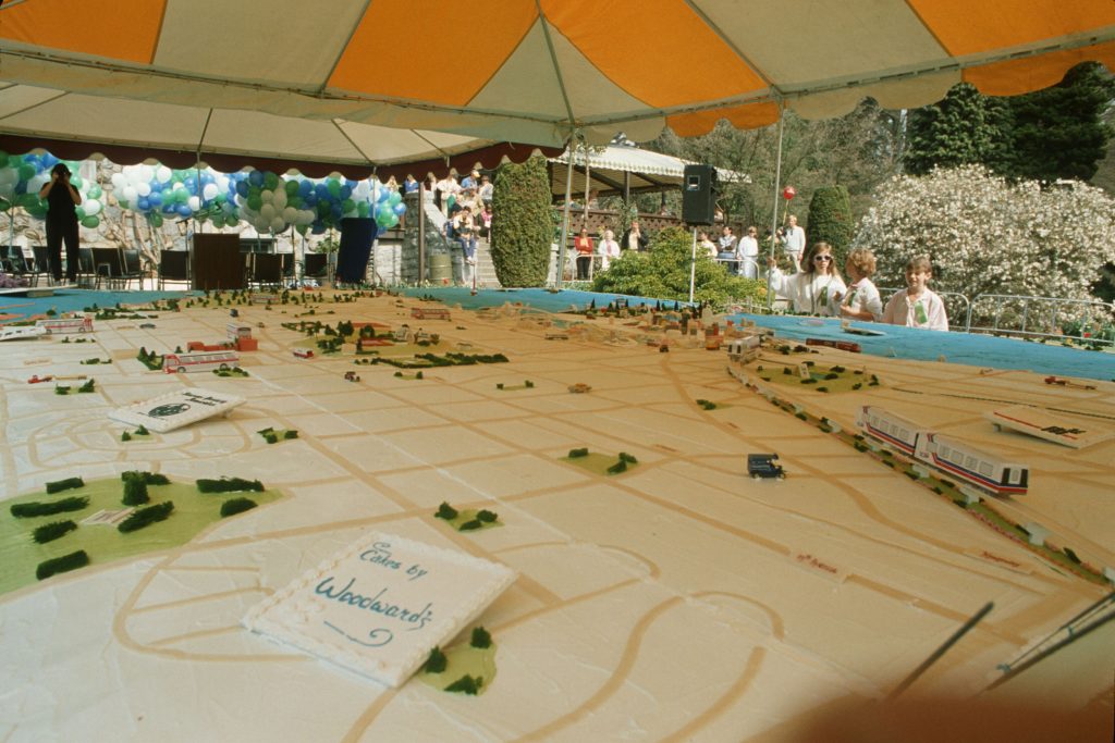 20 foot by 24 foot cake for Centennial birthday celebration at Stanley Park, created by Woodward’s. Reference code AM1576-S6-12-F65-: 2011-010.639
