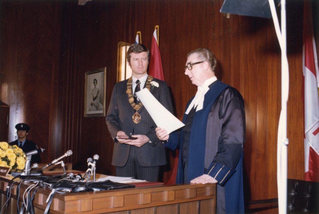 Mayor Art Phillips taking oath of office, 1975. Reference code: COV-S532-F01-: CVA 93-3 
