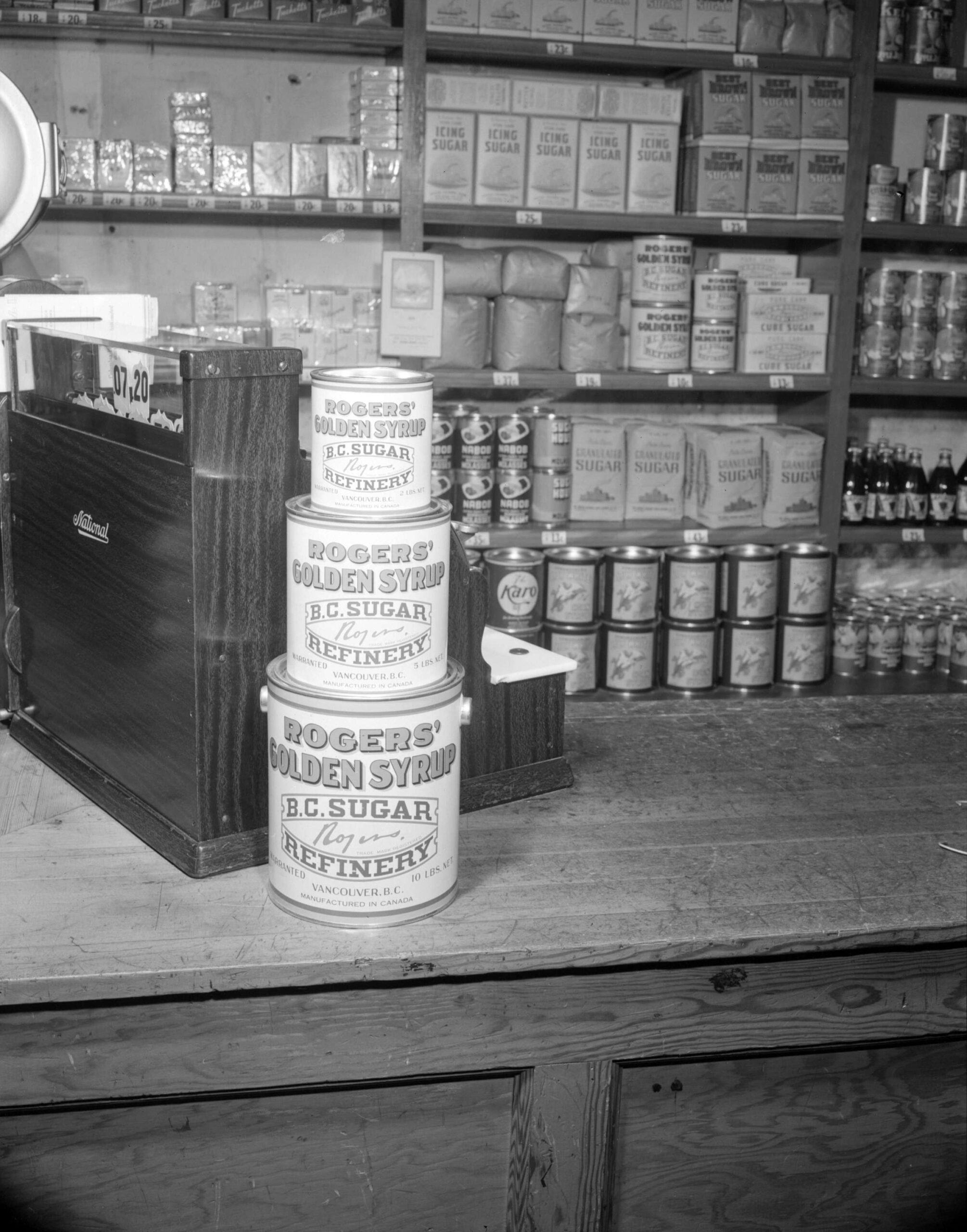 Display of Rogers’ golden syrup by a register, ca. 1945. Reference code: AM1184-S1-: CVA 1184-1762