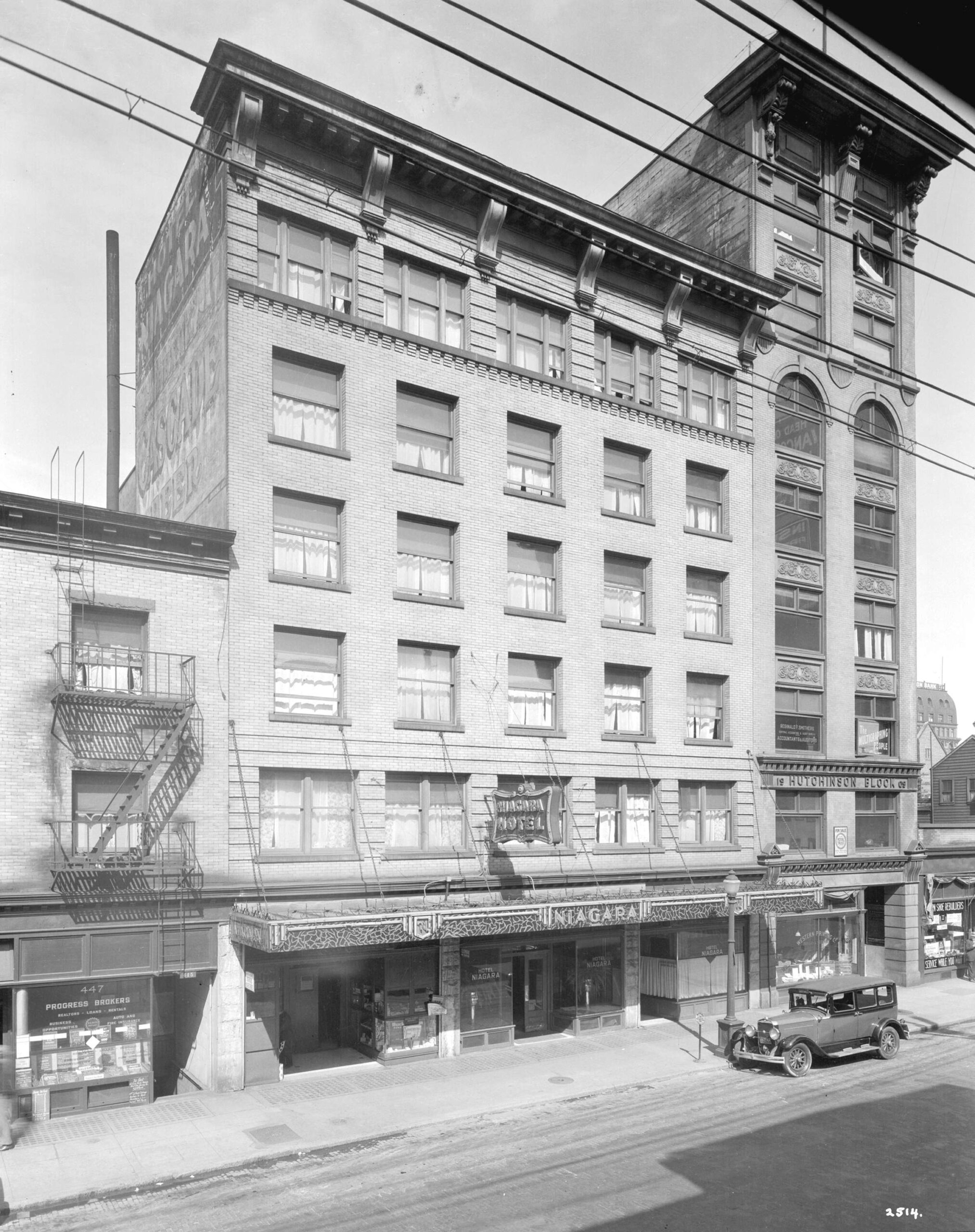 The Hutchinson Block designed by architect W.F. Gardiner is the tall skinny building at the very right of the photo, as seen in 1932. Reference code: AM1535-: CVA 99-4179