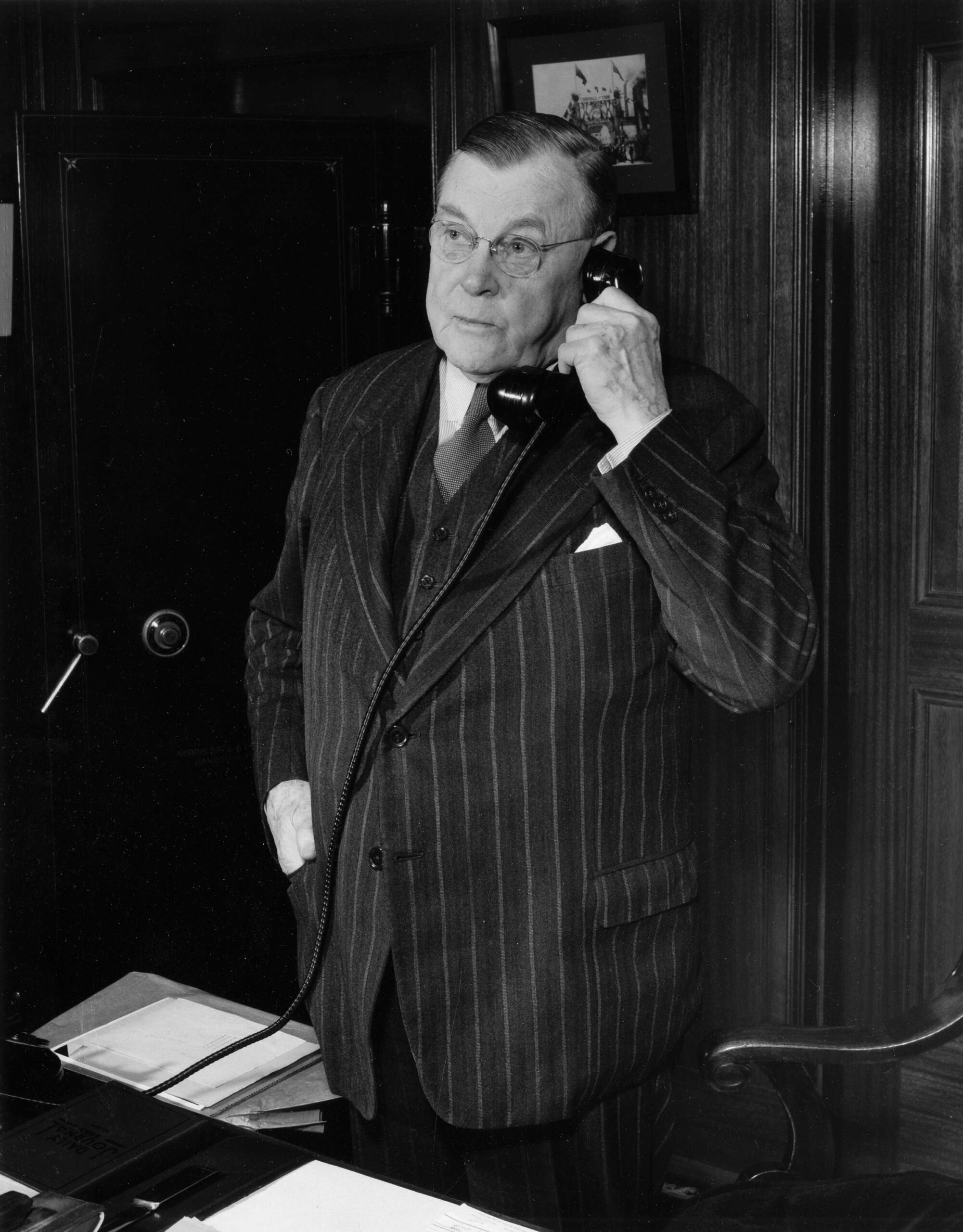 [Eric Hamber on the phone, ca. 1949. Reference code: AM1036-S2-: CVA 703-2.67.2]