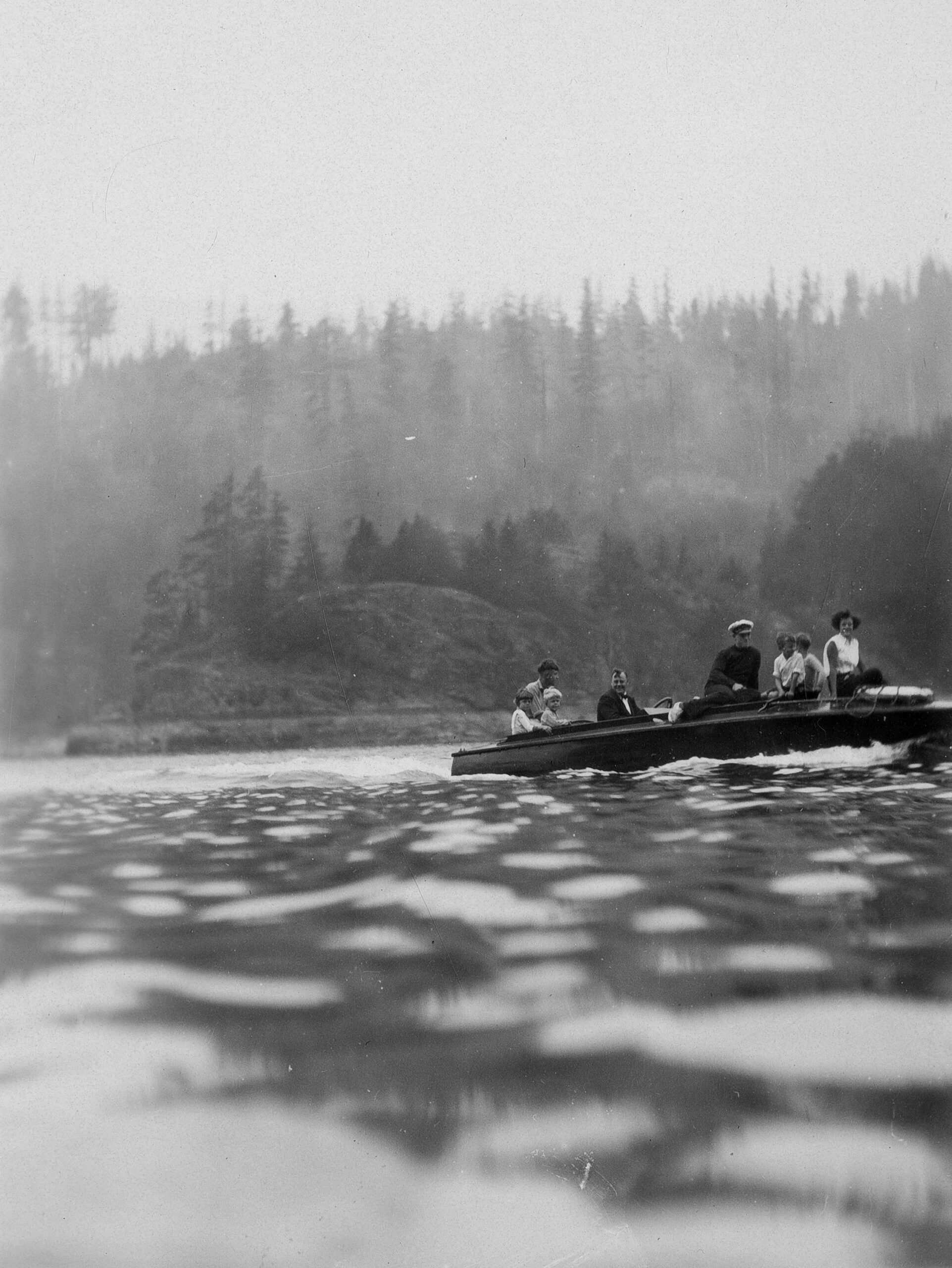 Eric Hamber taking group out in motorboat, some time between 1928 and 1940. Reference code: AM1036-S6-: CVA 703-6.13.113