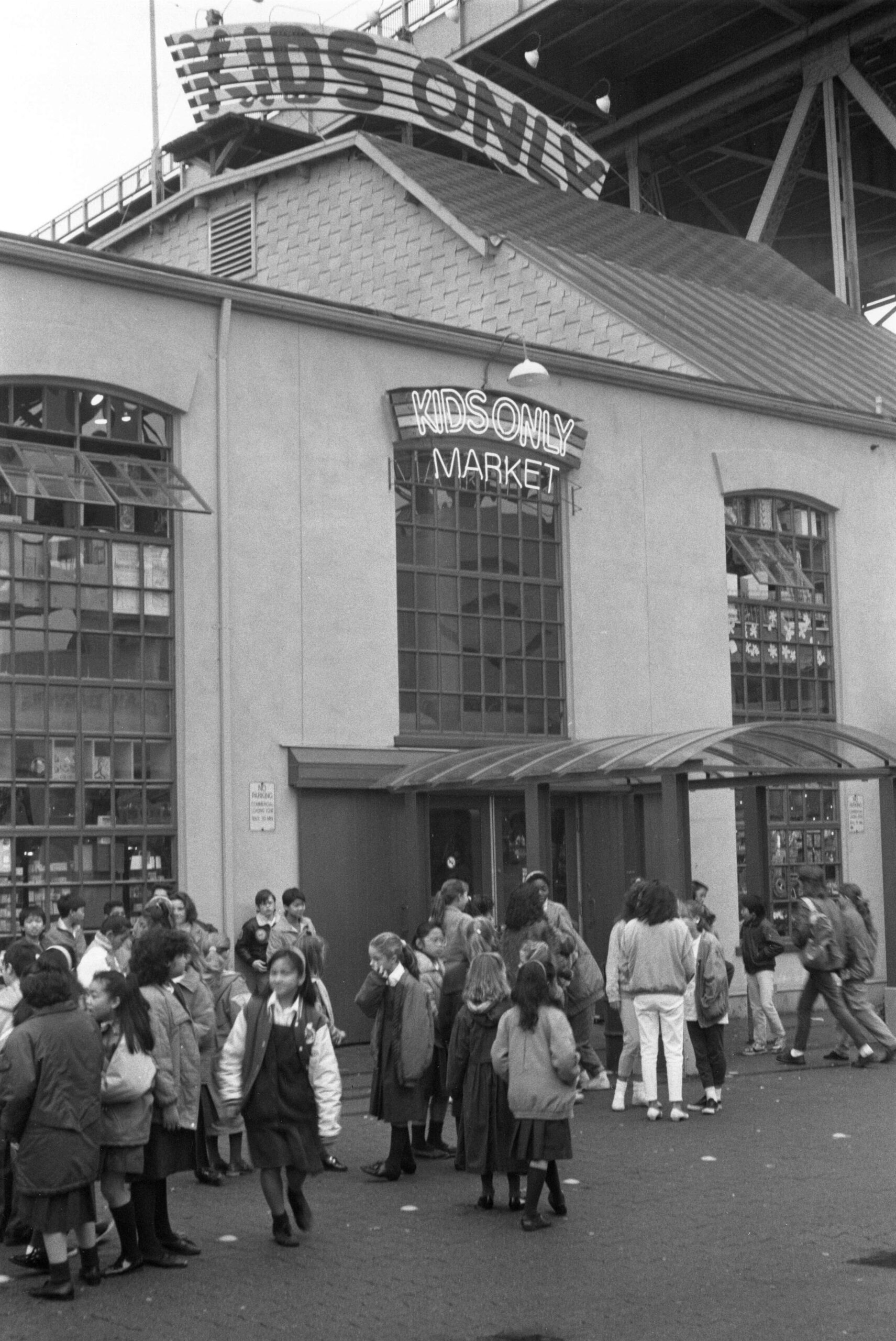 People outside Kids Only Market on Granville Island, 1980s. Reference code: AM1528-S1-F072-: 2008-127.01918