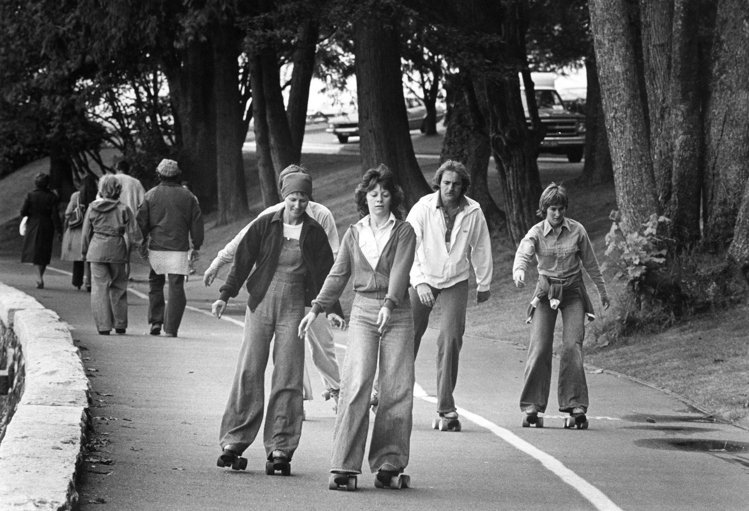 Roller skaters on the Stanley Park seawall, 1970s. Reference code: AM1528-S1-F188-: 2008-127.05619
