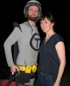 Digital archivist with unidentifiable superhero delivery man Digital archivist with unidentifiable superhero delivery man
