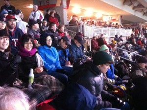 Very cold archivists under the overhang at the Twins game.