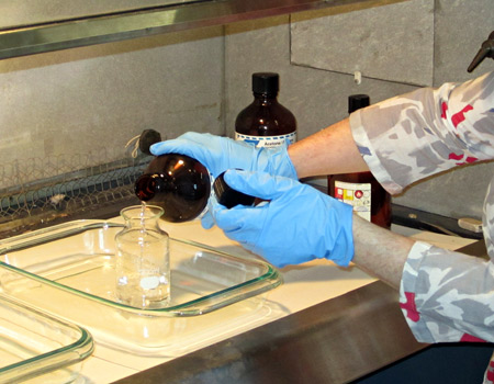 Chemical bath for emulsion stripping