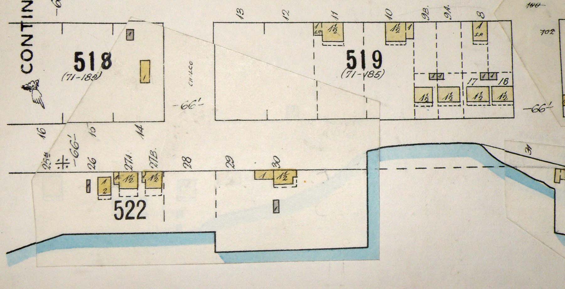 Detail from Map 384, showing buildings in the same two blocks as in the photograph.