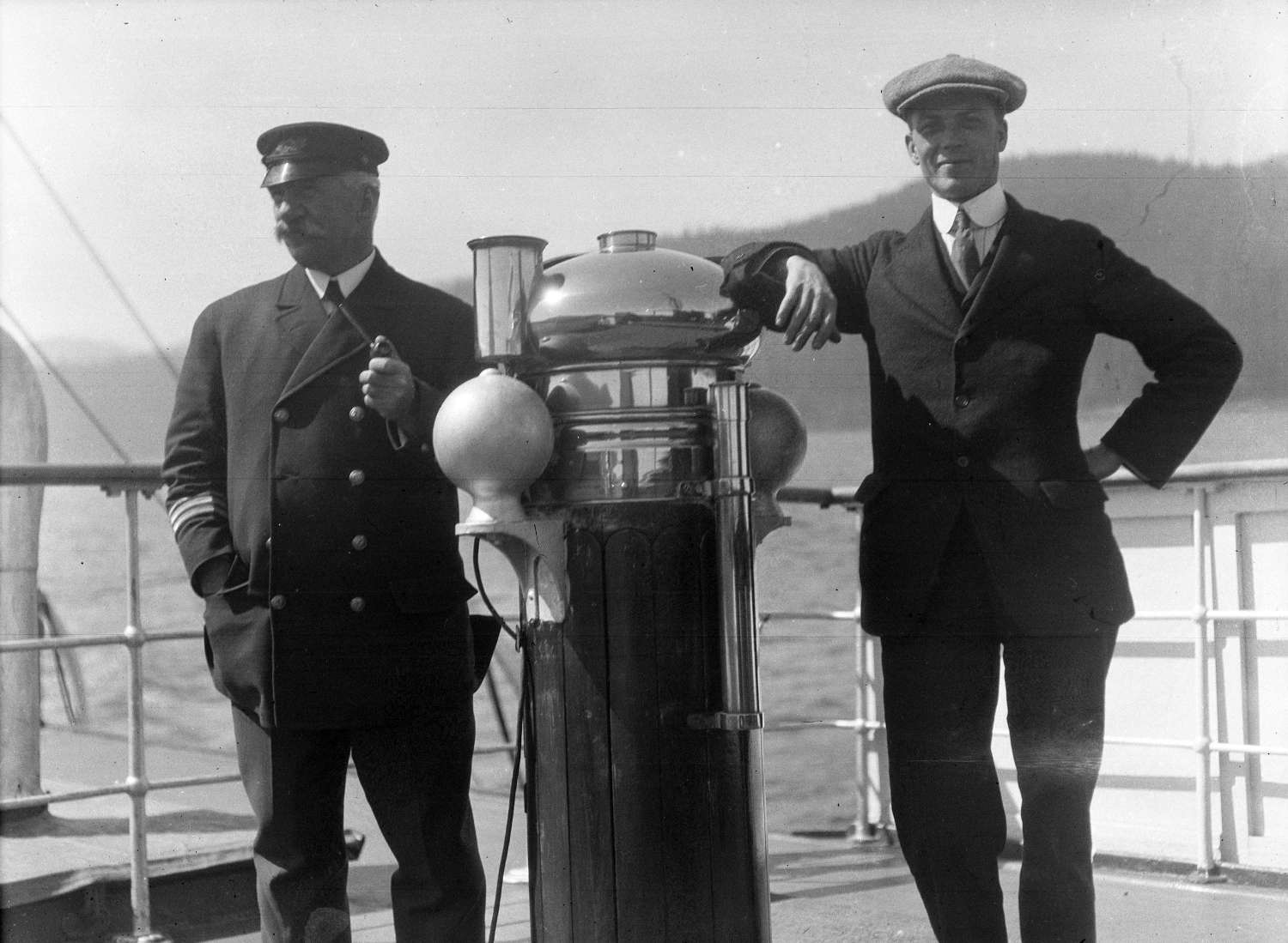 Captain Browne and Williams aboard S.S. Camosun, ~1918. Reference code AM640-: CVA 260-1090.