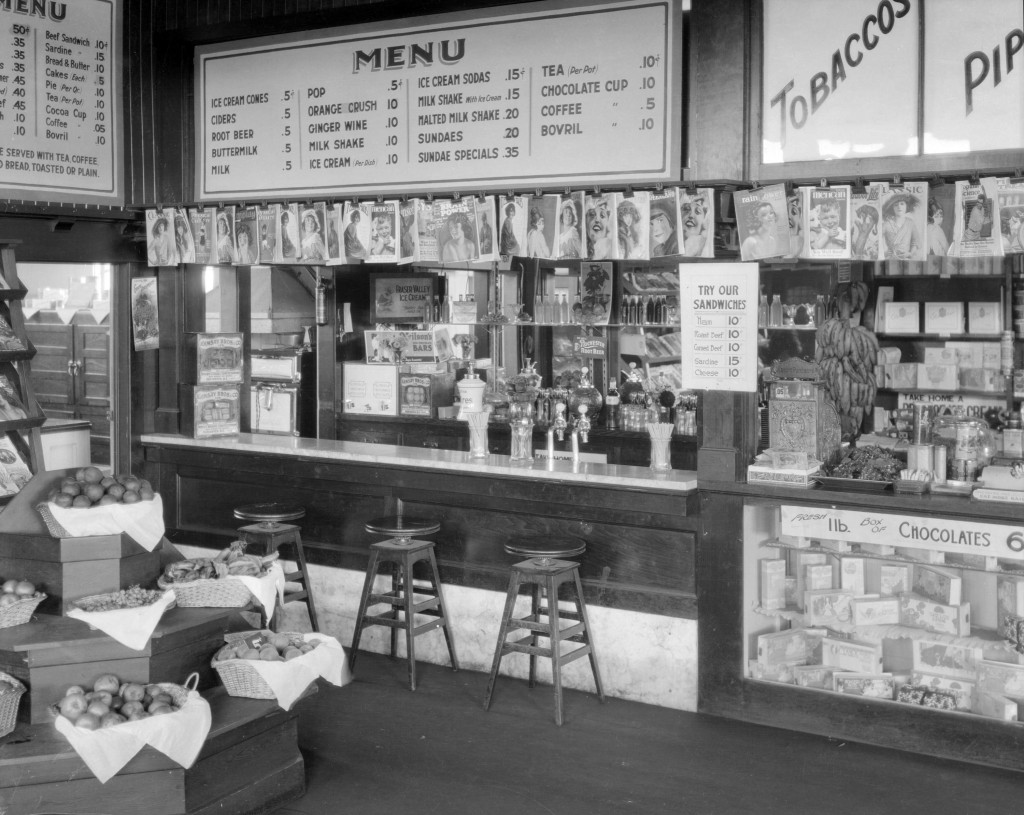 B.C. Electric Railway Company News Stands- lunch counter, 1921. Stuart Thomson, photographer. Reference code: AM1535-: CVA 99-3551