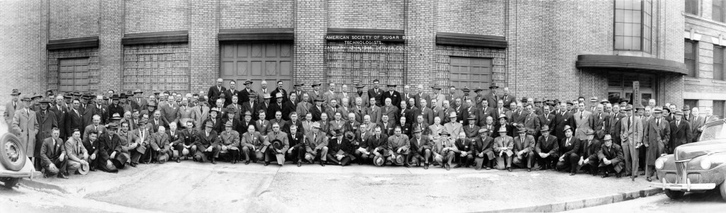 Group portrait of the American Society of Sugar Beet Technologists attending a conference January 12-14, 1946 in Denver, Colorado. There is one woman in the photo—can you locate her? Reference code: 2011-092.1438.