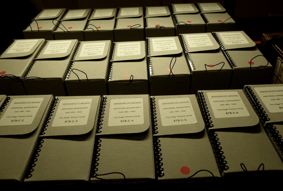 Dramatic records - City Stage Theatre records stored in acid-free folders inside Hollinger boxes. Photograph by Cristen Polley