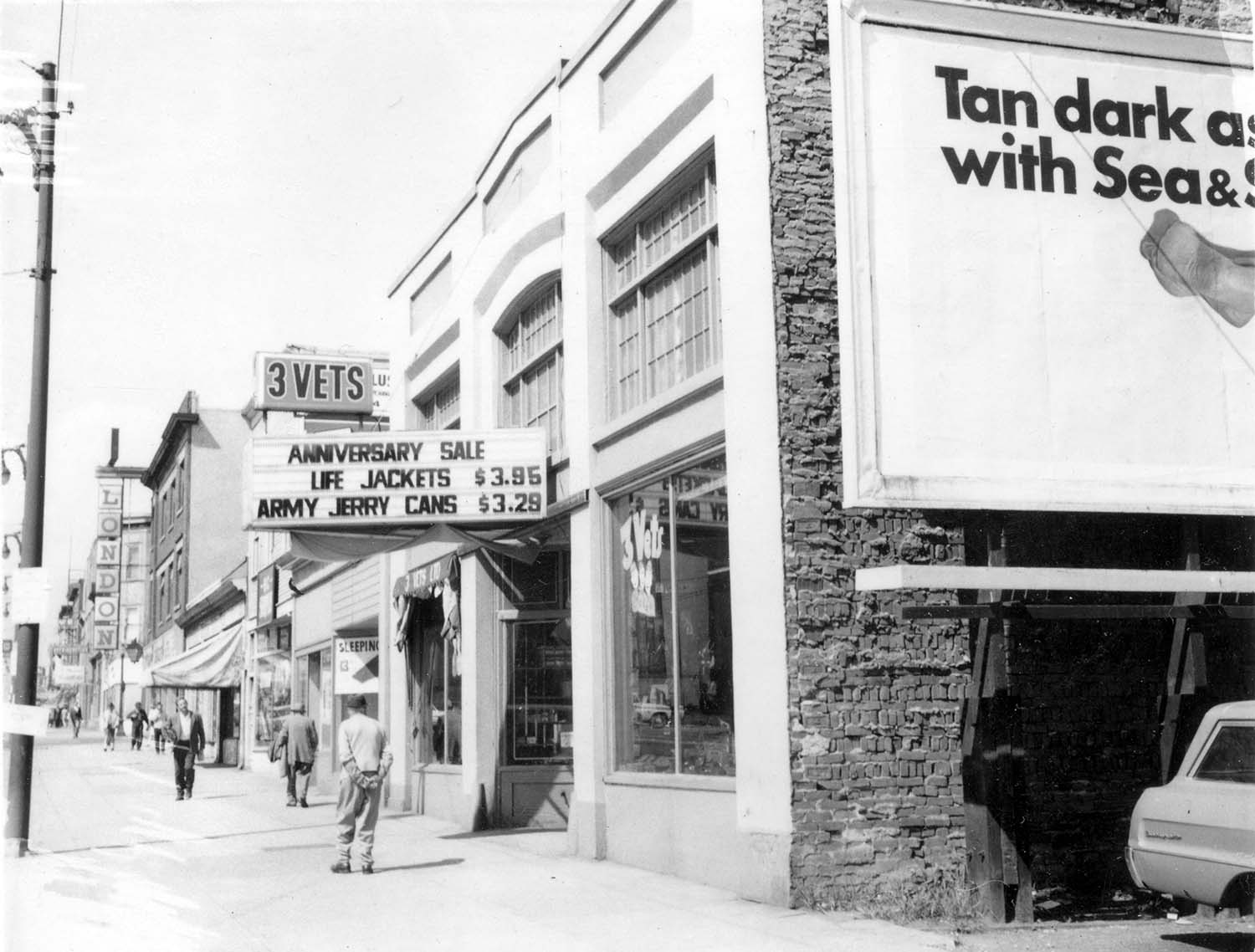 832 Main Street, 1968. Photograph shows 3 Vets War Surplus store. Reference code COV-S168-: CVA 203-18
