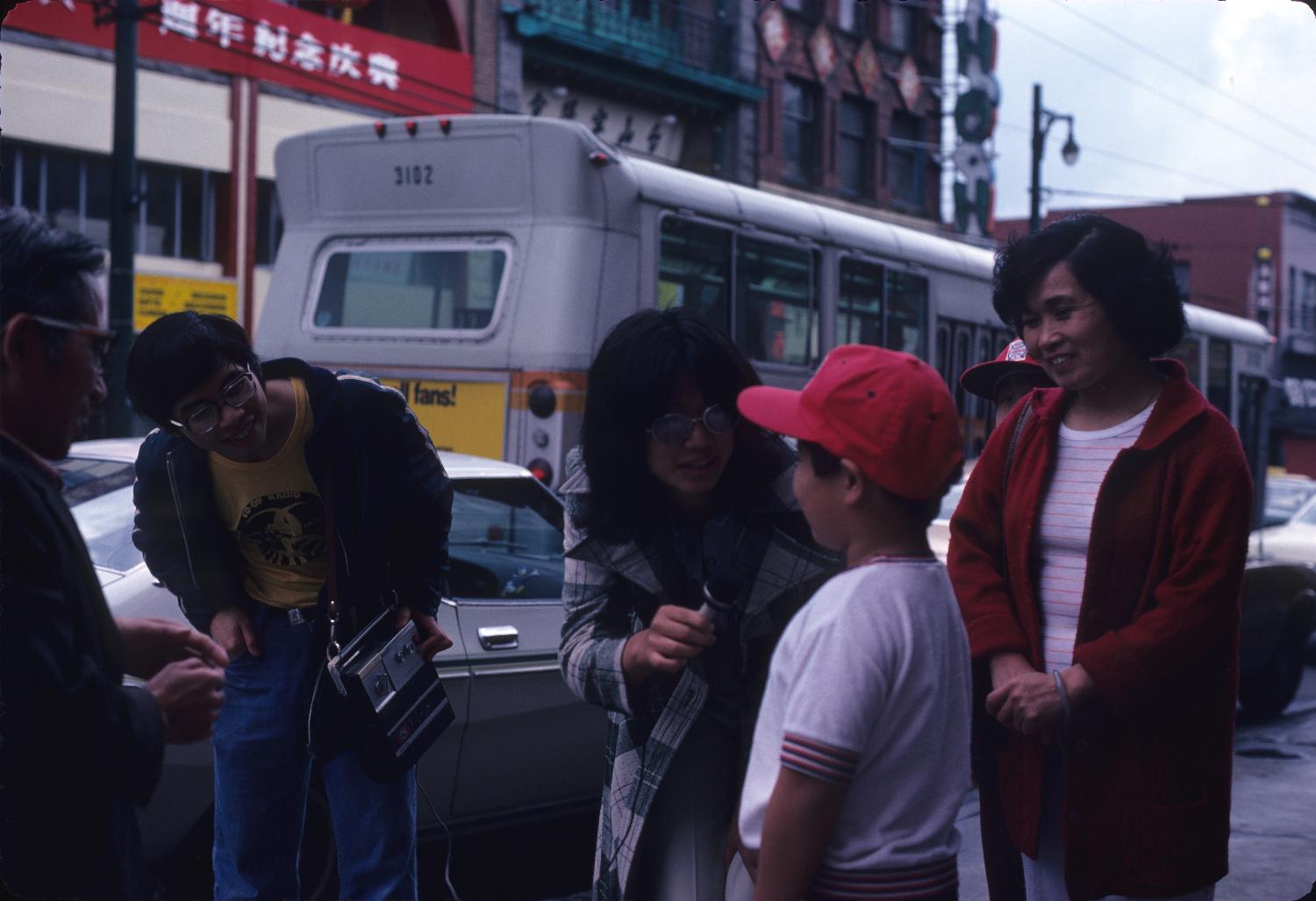 Pender Guy volunteers interviewing people on Pender Street. Photographer: Paul Yee. Reference code AM1523-S6-F68-: 2008-010.0428.