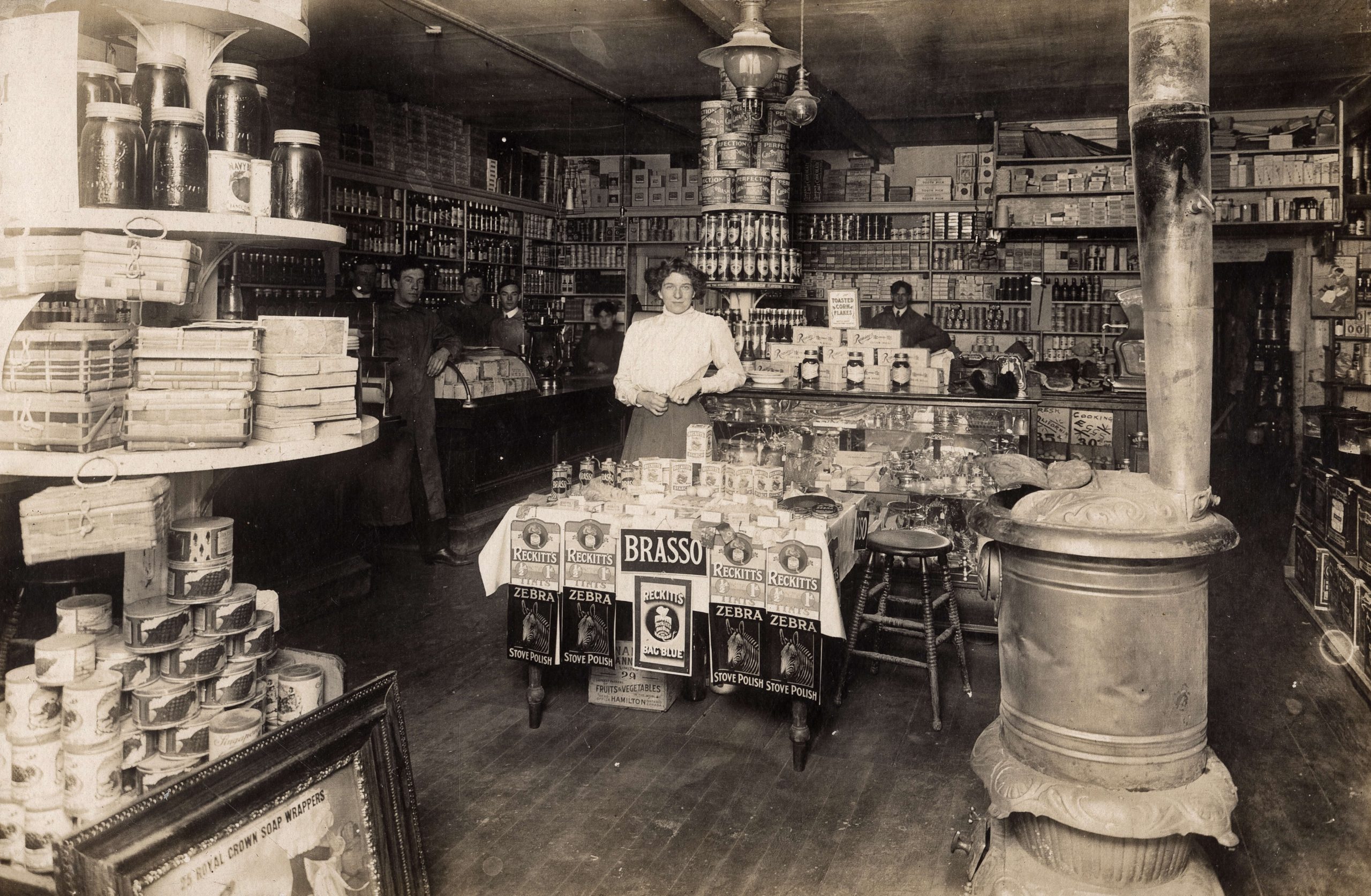 Inside the shop with tinned vegetables, corn flakes and cleaning polish. Reference code: AM1376-: 2017-028.1