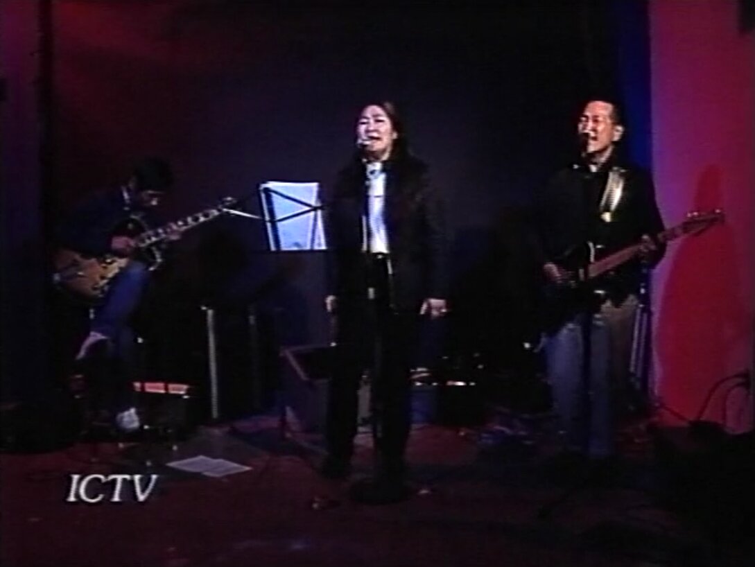 Still of members of Raw Silk performing “Head Tax Blues,” 2000. L-R: Tak Tonomura, Vivien Nishi, Sean Gunn. Reference code: AM1698-S1-: 2023-092.0100