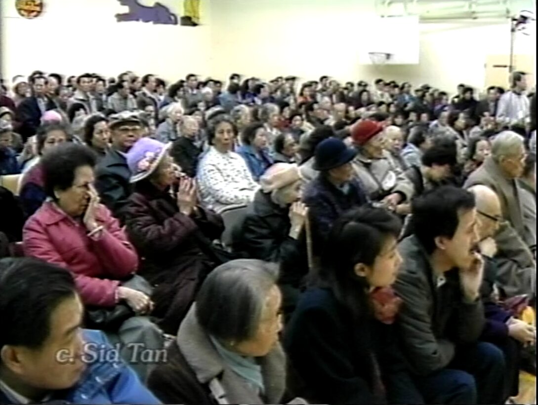 Still from Head Tax Redress Forum at Strathcona Elementary School, January 5, 1992. Reference code: AM1698-S1-: 2023-092.0087