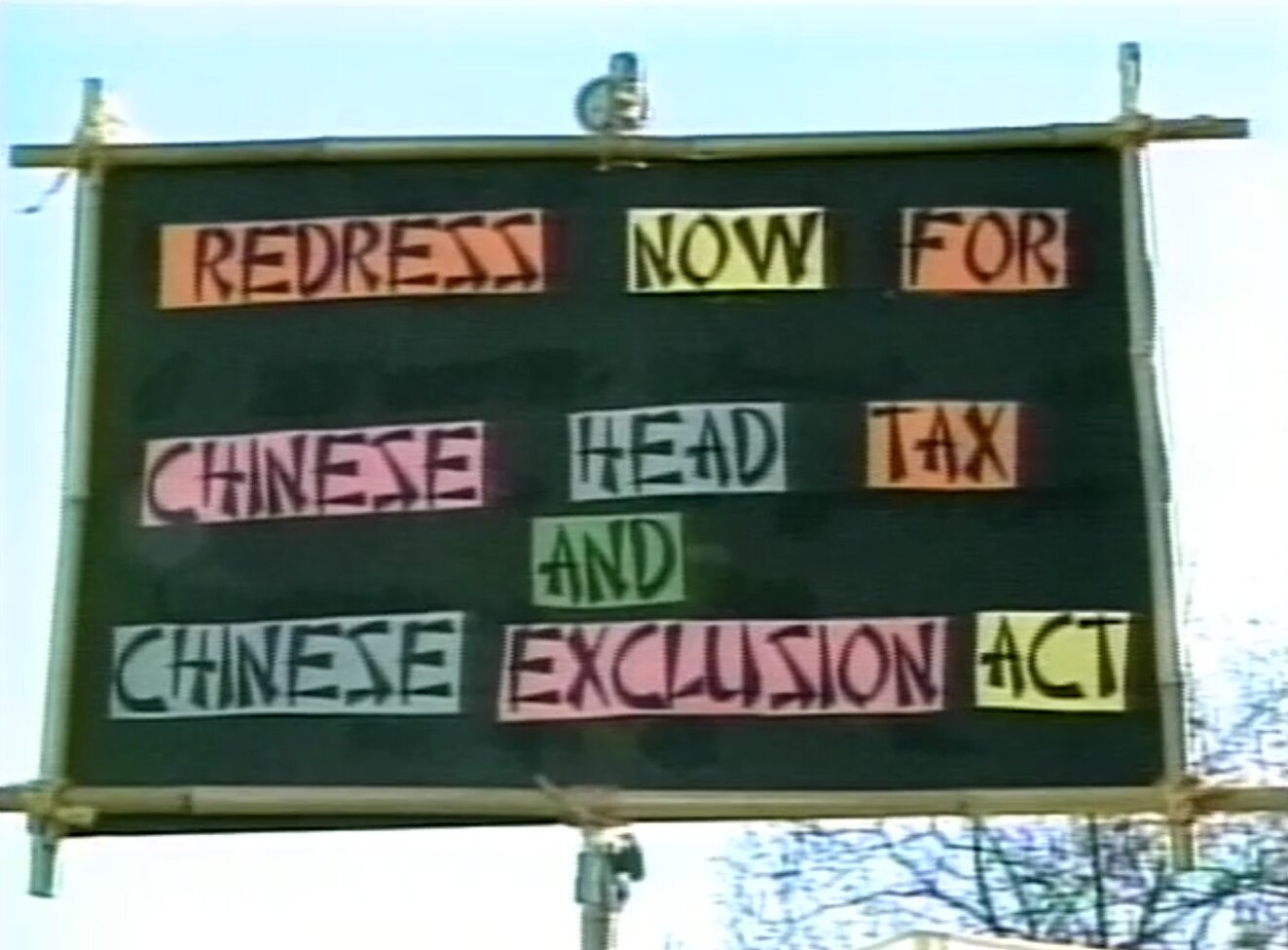 Still from B.C. Coalition of Head Tax Payers, Spouses and Dependents rally in Vancouver, November 26, 2005. Reference code: AM1698-S1-: 2023-092.0745