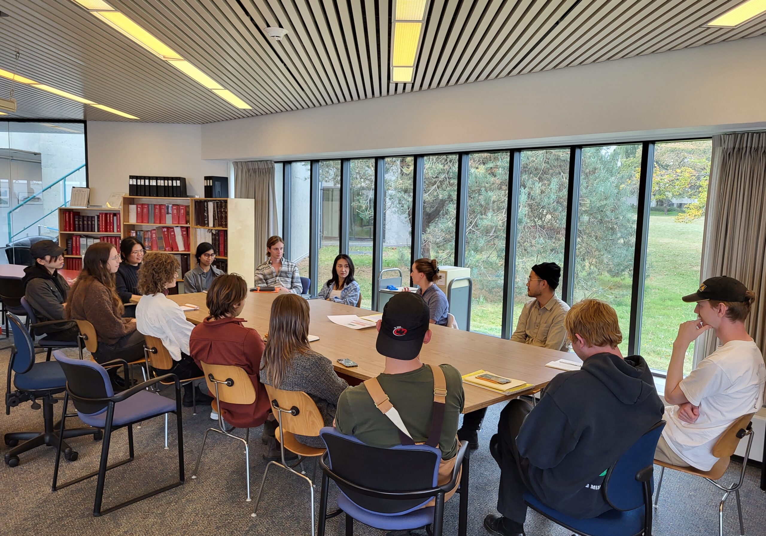 A class group gathered for an orientation in the Reading Room.