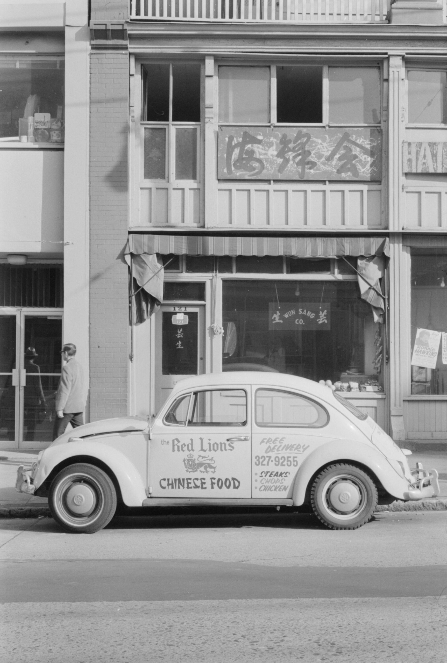 The Red Lions Chinese Food delivery car stopped in front of Wun Sang Co. confectionary (121 East Pender Street), between 1968 and 1973. Reference code: COV-S644-: CVA 1095-09429