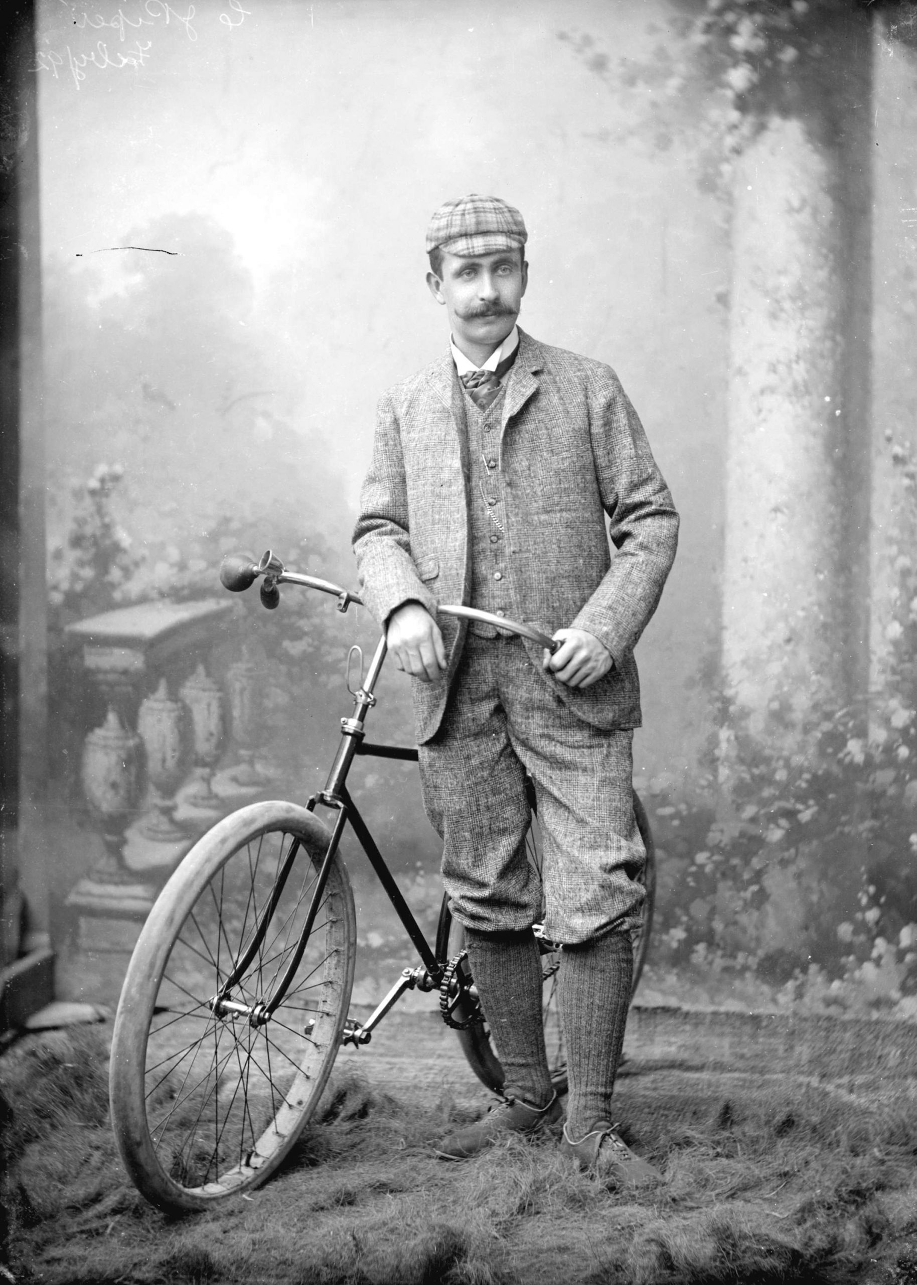 Charles James Piper posing with his bicycle, February 1892. Reference code: AM54-S4-: SGN 416