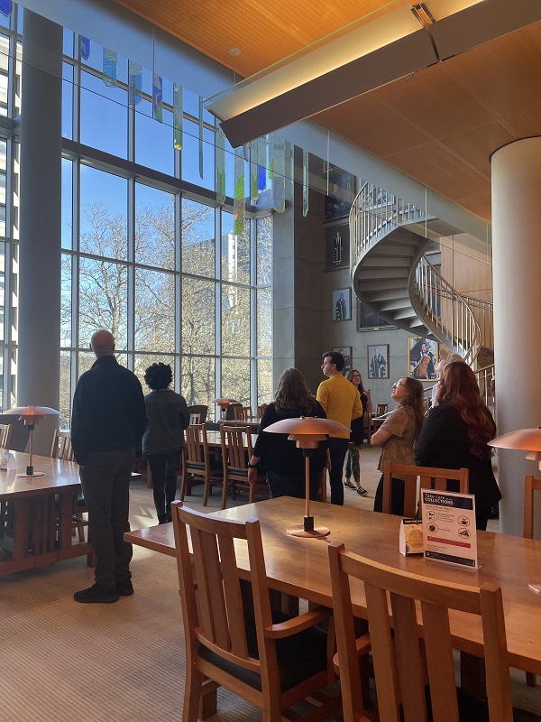 Attendees enjoying a tour of the UBC Music, Art and Architecture Library given by Paula Farrar. Photo by Bronwyn Smyth