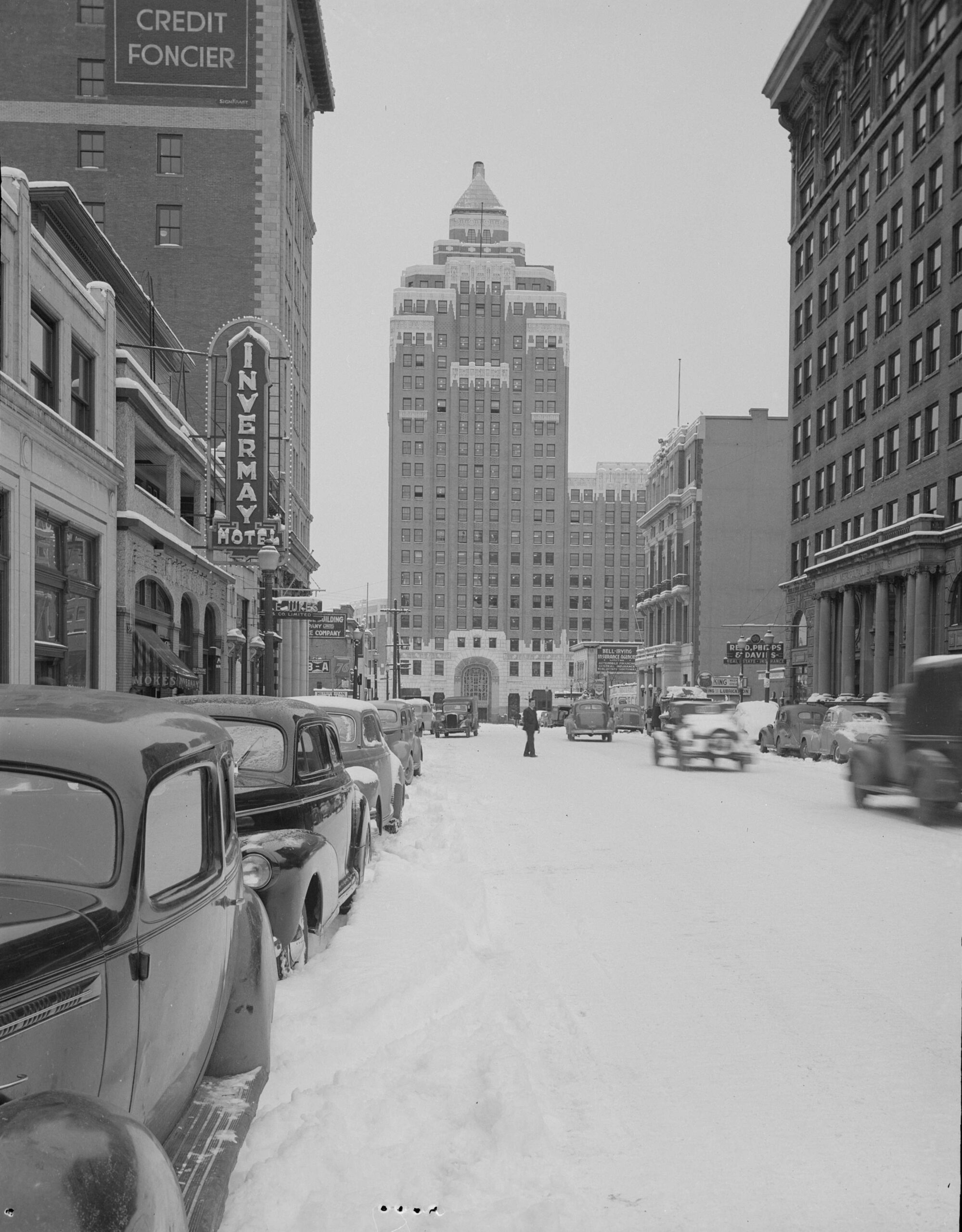 Snow scene on Hastings St. looking west to Invermay Hotel and Marine Building, Jan. 16, 1947. Reference code: AM1545-S3-: CVA 586-15767
