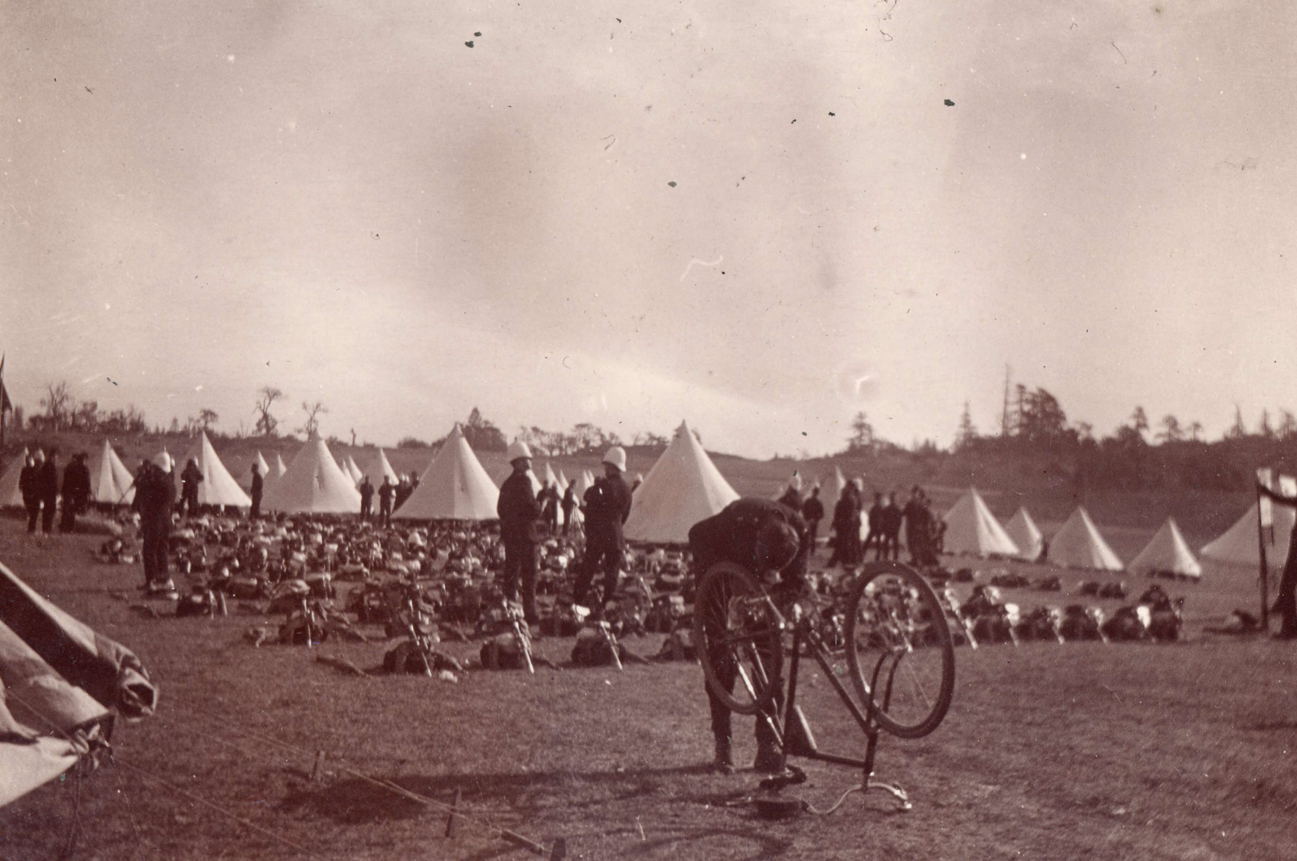 Soldier repairing bicycle. Reference code: AM54-S4-: Mil P135.3