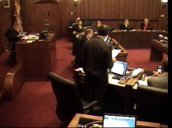 Regular Council meeting, December 13, 2005. Multiple cameras were used to record the meetings, but getting a good angle was clearly a challenge at times. Reference code: COV-S719-F0068