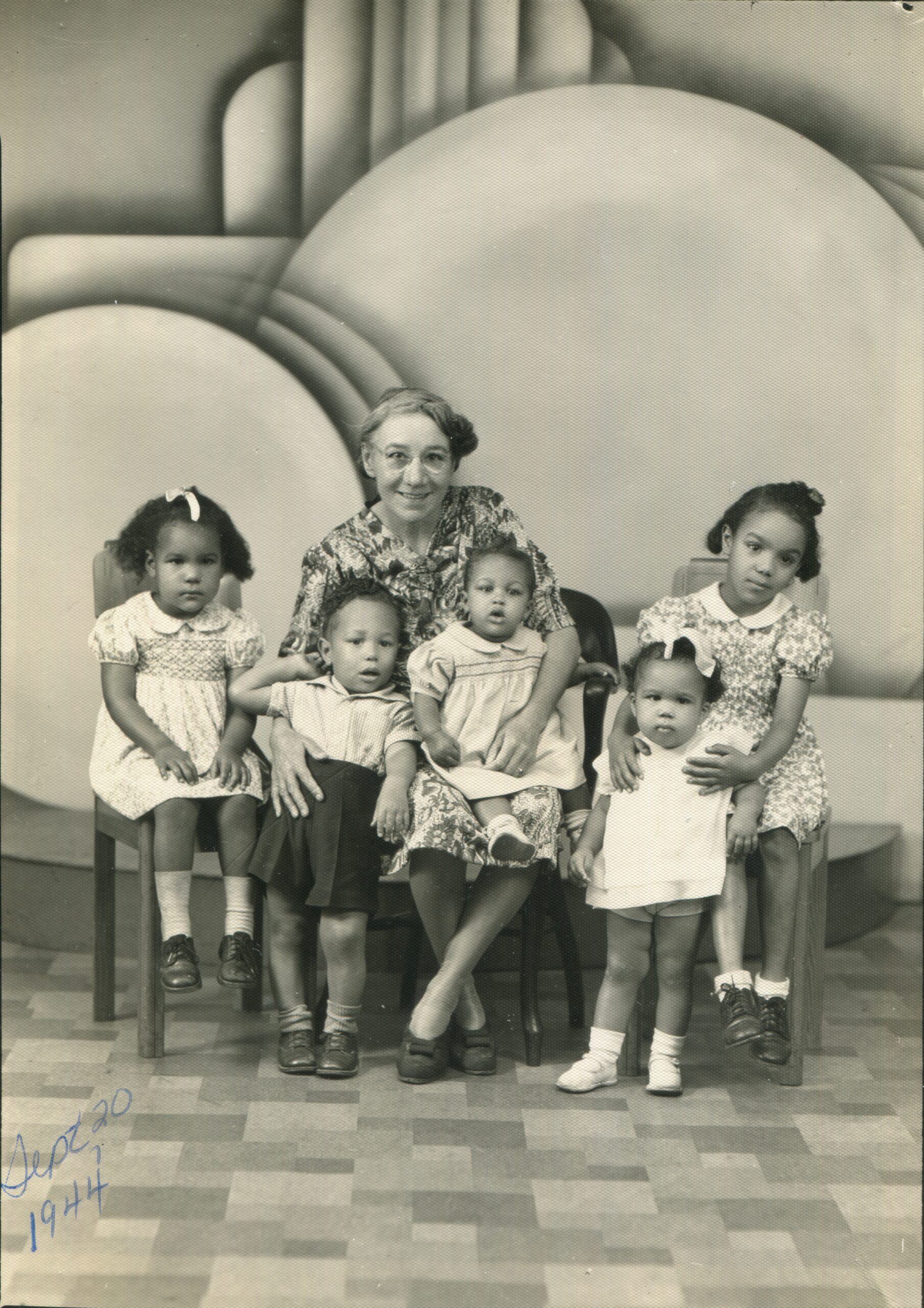 Emily Aida Collins and her grandchildren, 1944. Reference code: AM1688-S1-F5-: 2021-034.154
