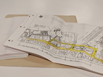 A file from Series 726 showing City reporting with drawings related to downtown zoning