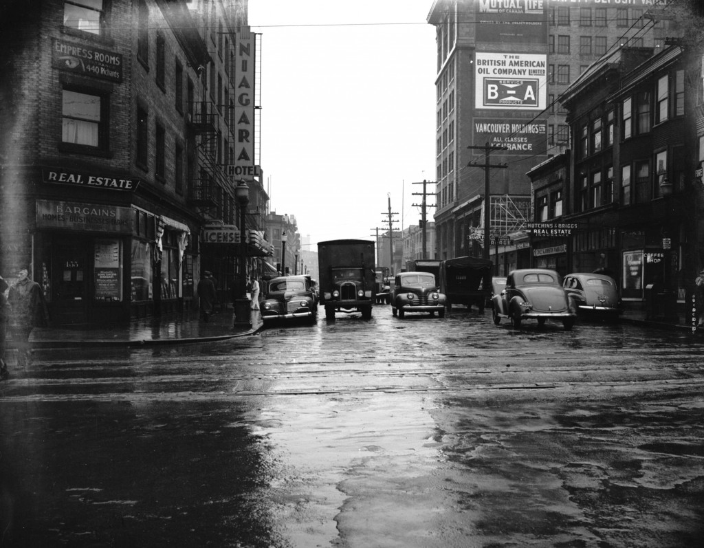 Archival photograph selected by Courtney Naesgaard for the Merging Time exhibit. Street traffic at Pender Street and Richards Street, 1946. Reference code: AM1545-S3-: CVA 586-4225.