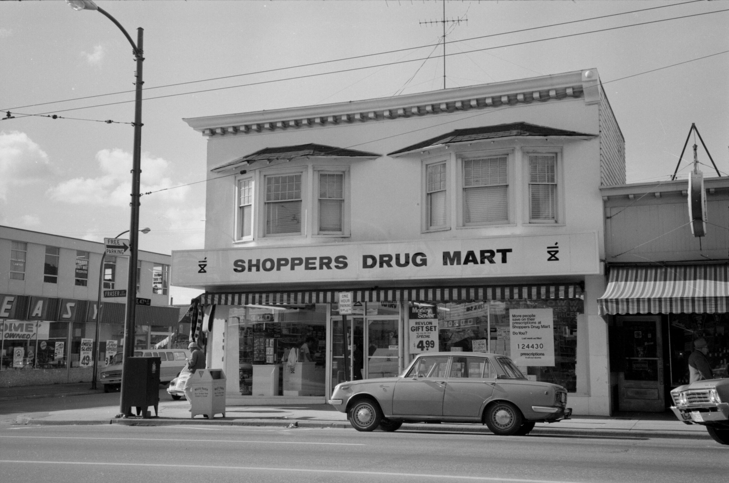 Shoppers Drug Mart at the intersection of Fraser St. and East 47th Ave. Reference code: COV-S644: CVA 1095-02192