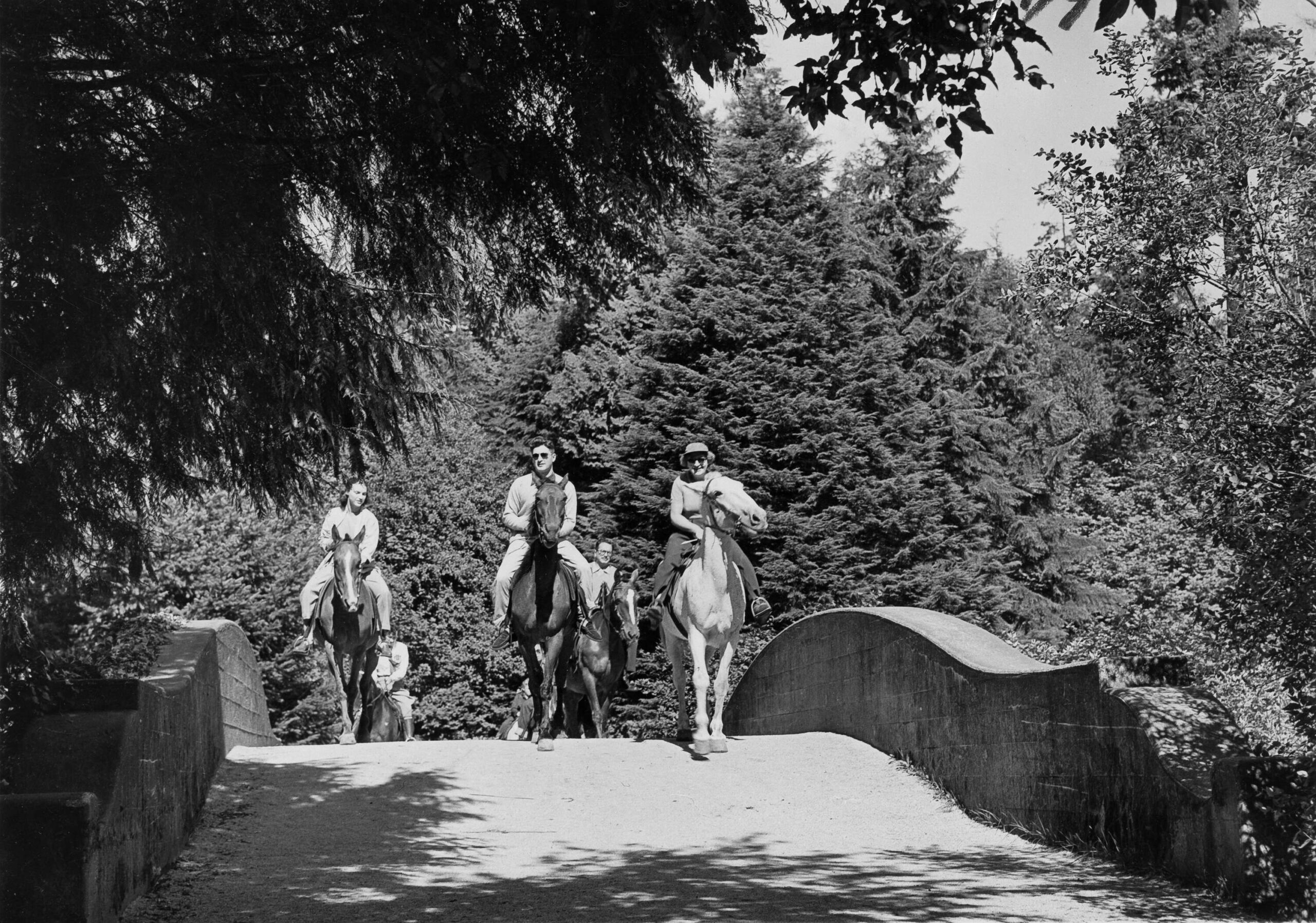Out for a trail ride through Stanley Park, 1950s. Reference code: VPK-S625-: CVA 392-1253