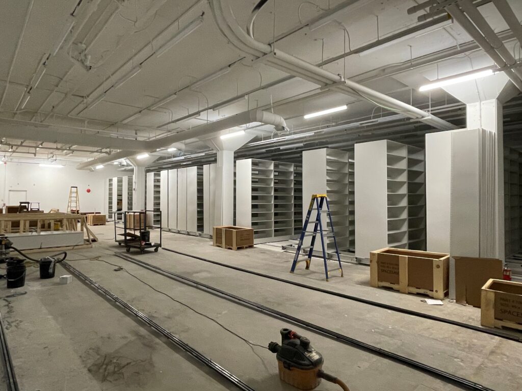 Rails for second of three mobile floor sections being laid out