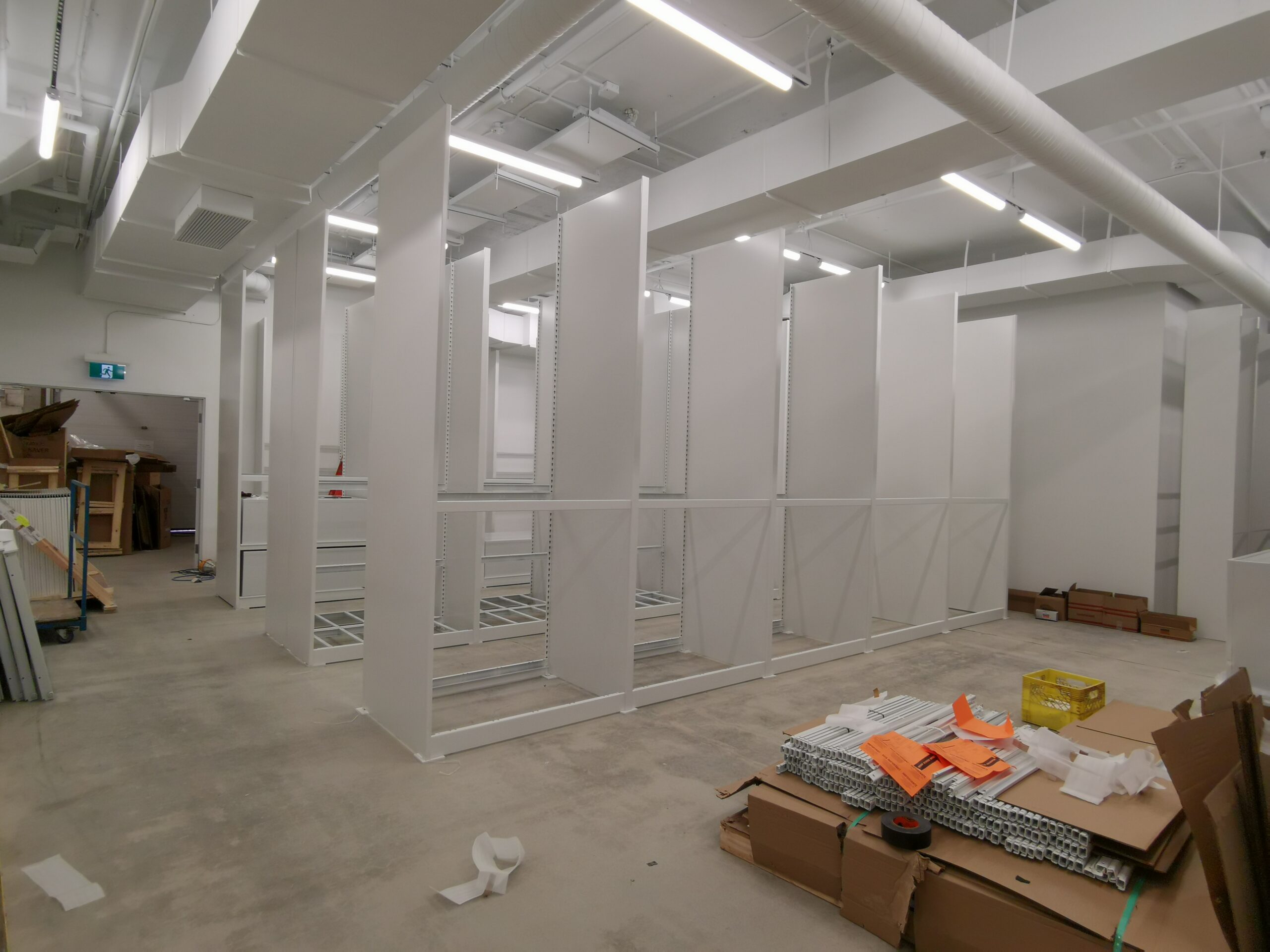 Oversize static shelving being installed
