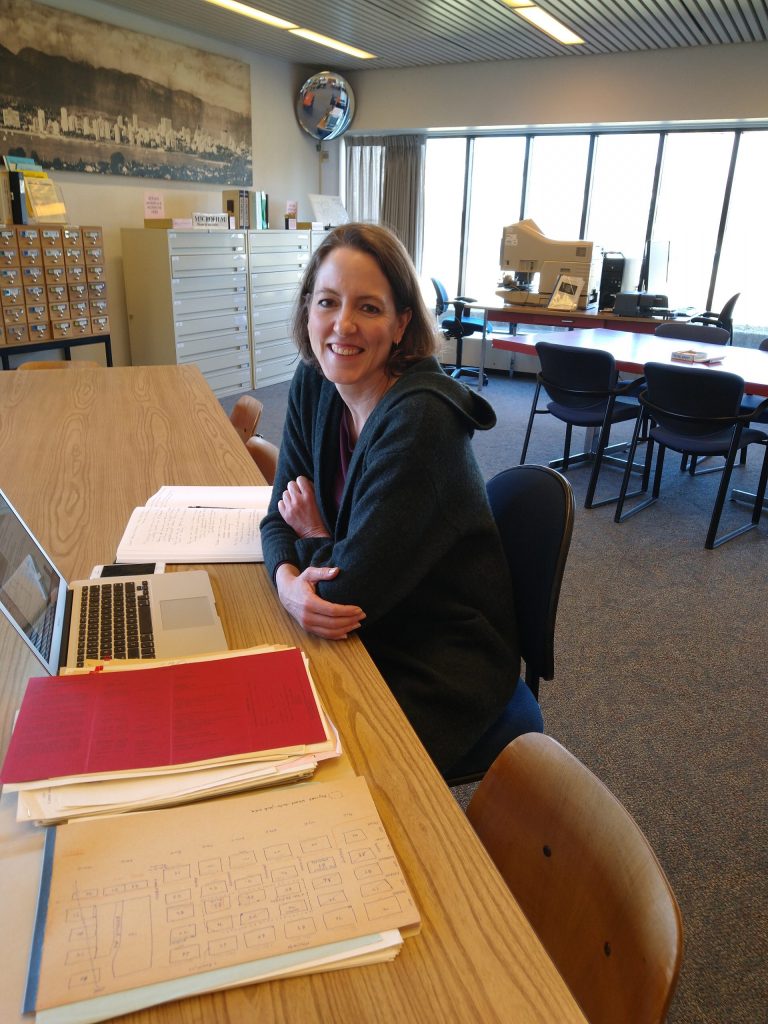 Jennifer Chutter in the Archives’ Reading Room (before COVID-19 restrictions). Photo by Kira Baker. 