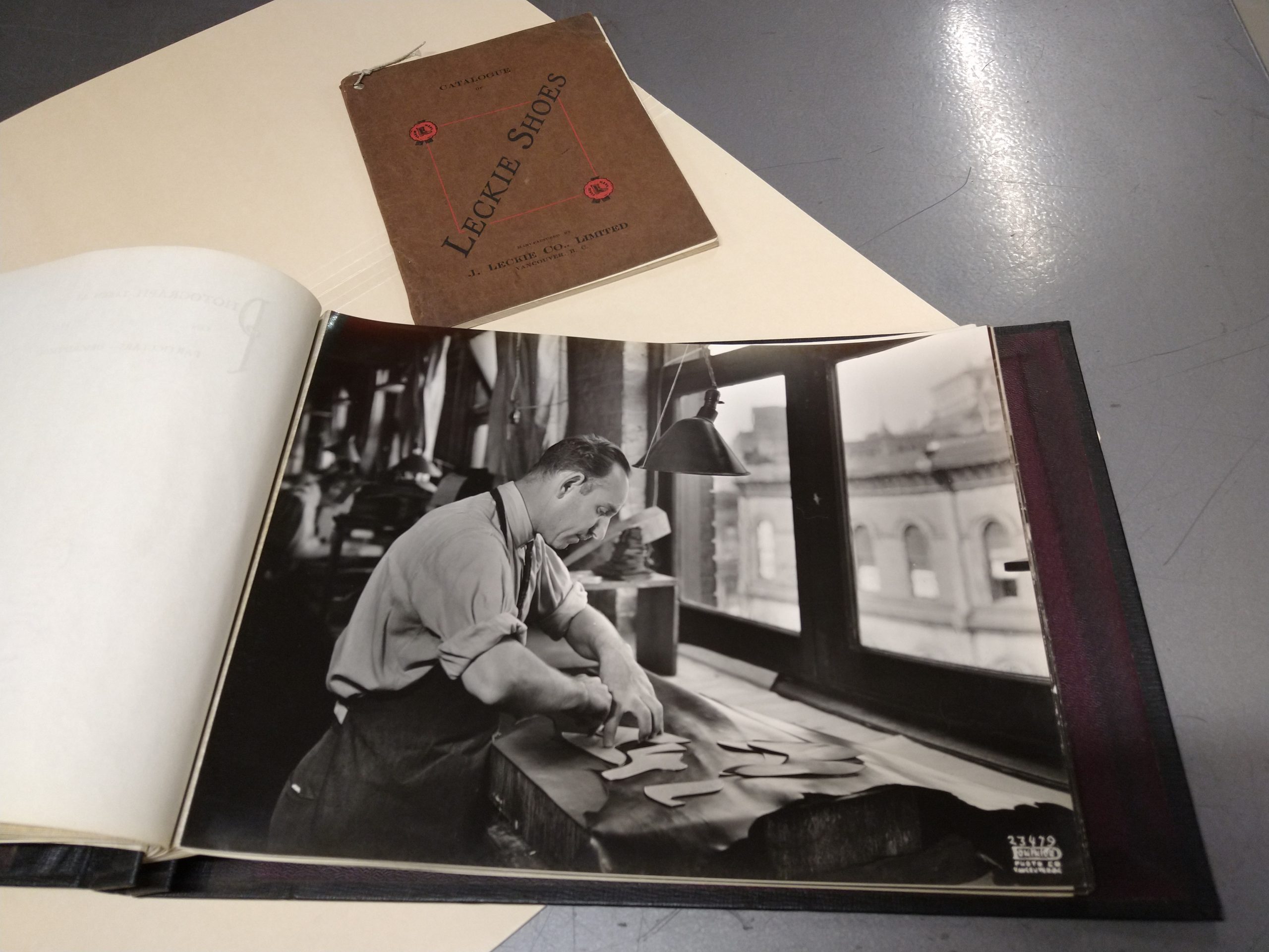 A photograph album and catalogue for the Leckie Shoe Company, ca. 1923, donated in 2019. Photo by Kira Baker.