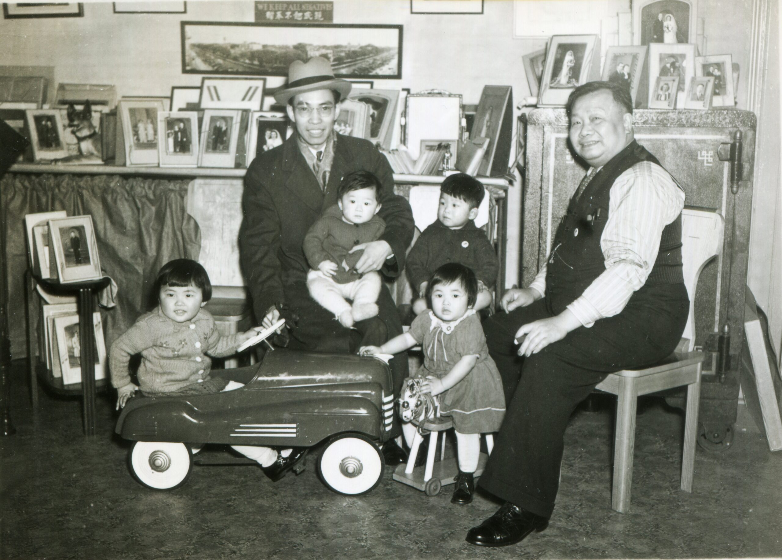 Yucho Chow with grandchildren in studio, 1942. Reference code: AM1688-S2-F6-: 2021-034.638