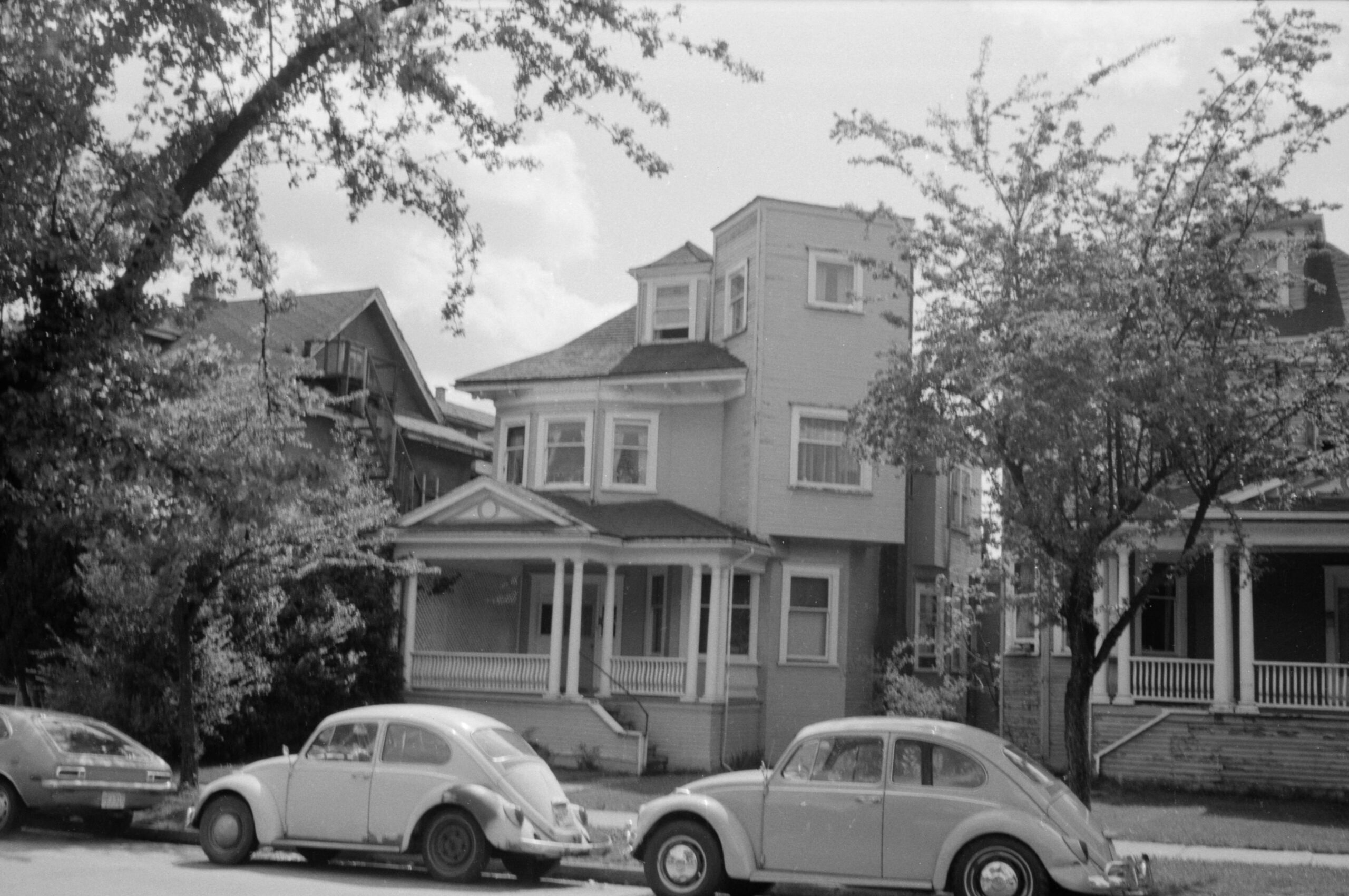Double the Punch Buggy fun in this picture of 1110 Comox Street, 1974. Reference code: COV-S644-: CVA 1095-01384